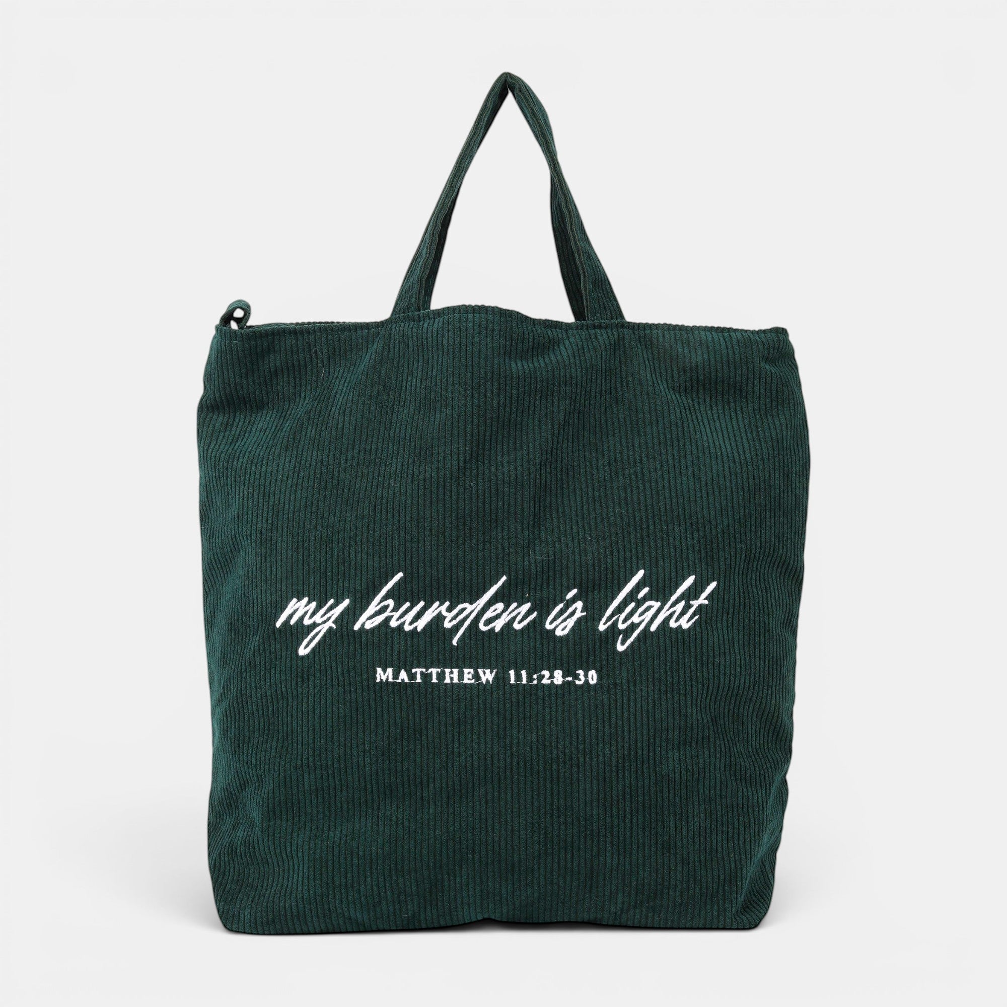 Shalom Living dark green corduroy tote bag with embroidered text "my burden is light" and "MATTHEW 11:28-30".