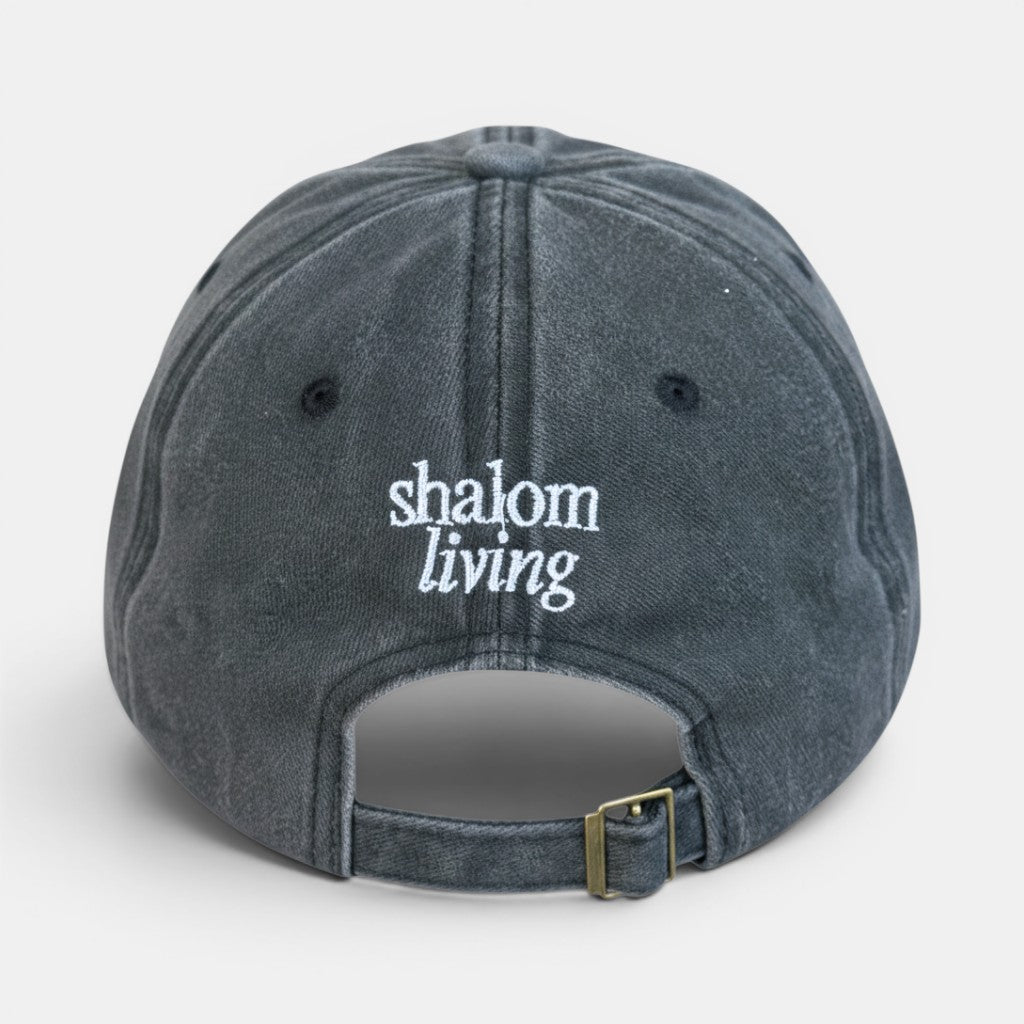 Shalom Living dark grey vintage washed cotton adjustable cap with embroidered text.