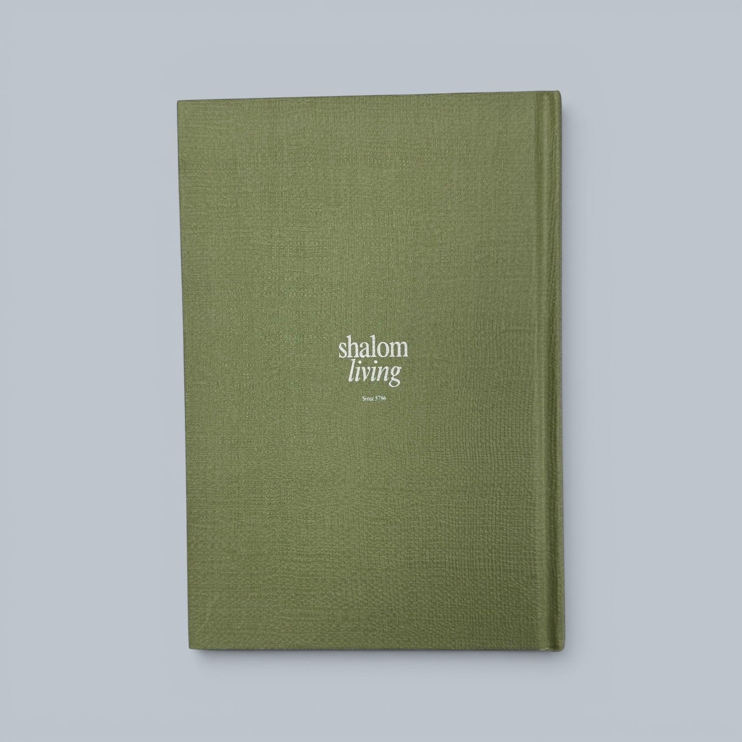 Shalom Living Immanuel Journal Book with lined paper pages and softcover finish in a muted green color.