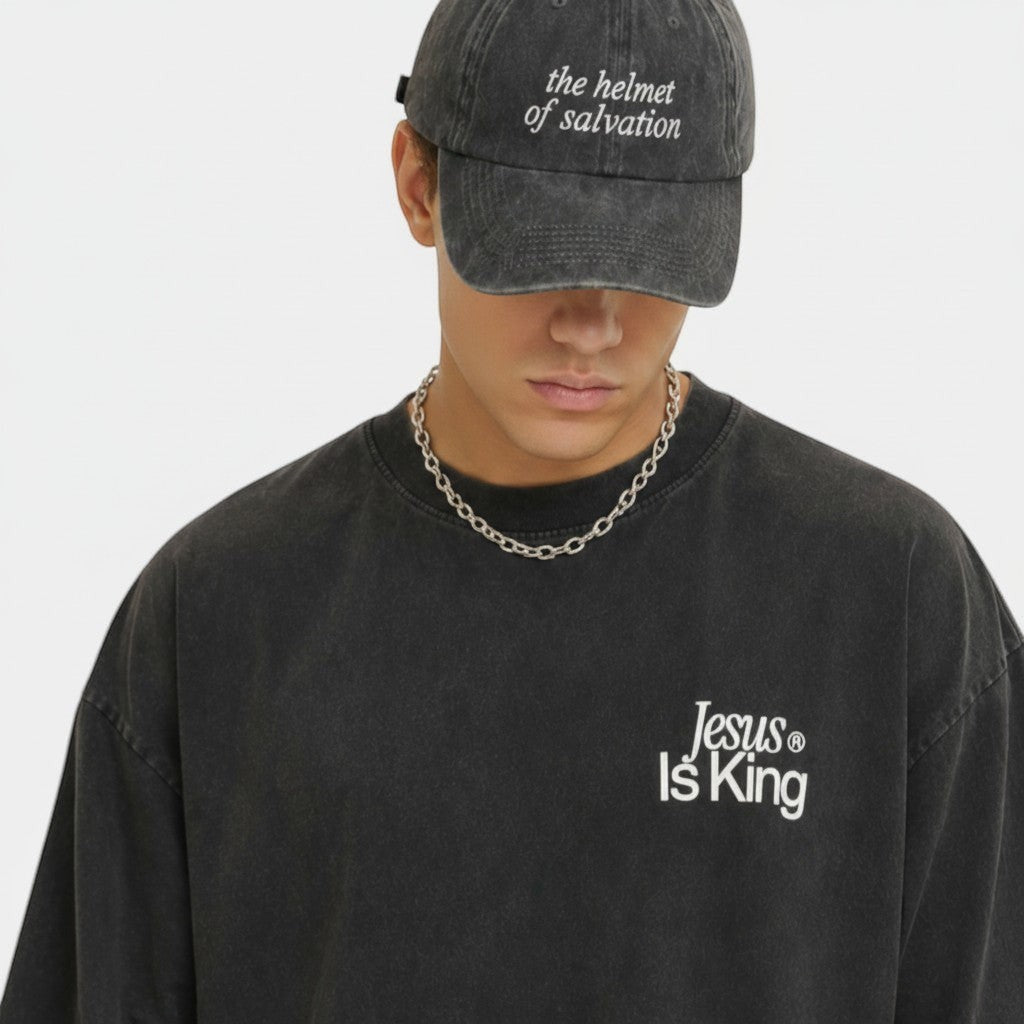 Shalom Living charcoal grey oversized vintage washed cotton t-shirt with "Jesus Is King" graphic.