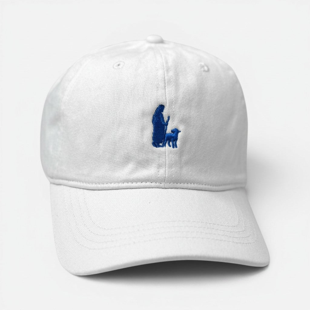 Shalom Living white cotton kids cap with blue embroidered Jesus and lamb design on the front and curved brim