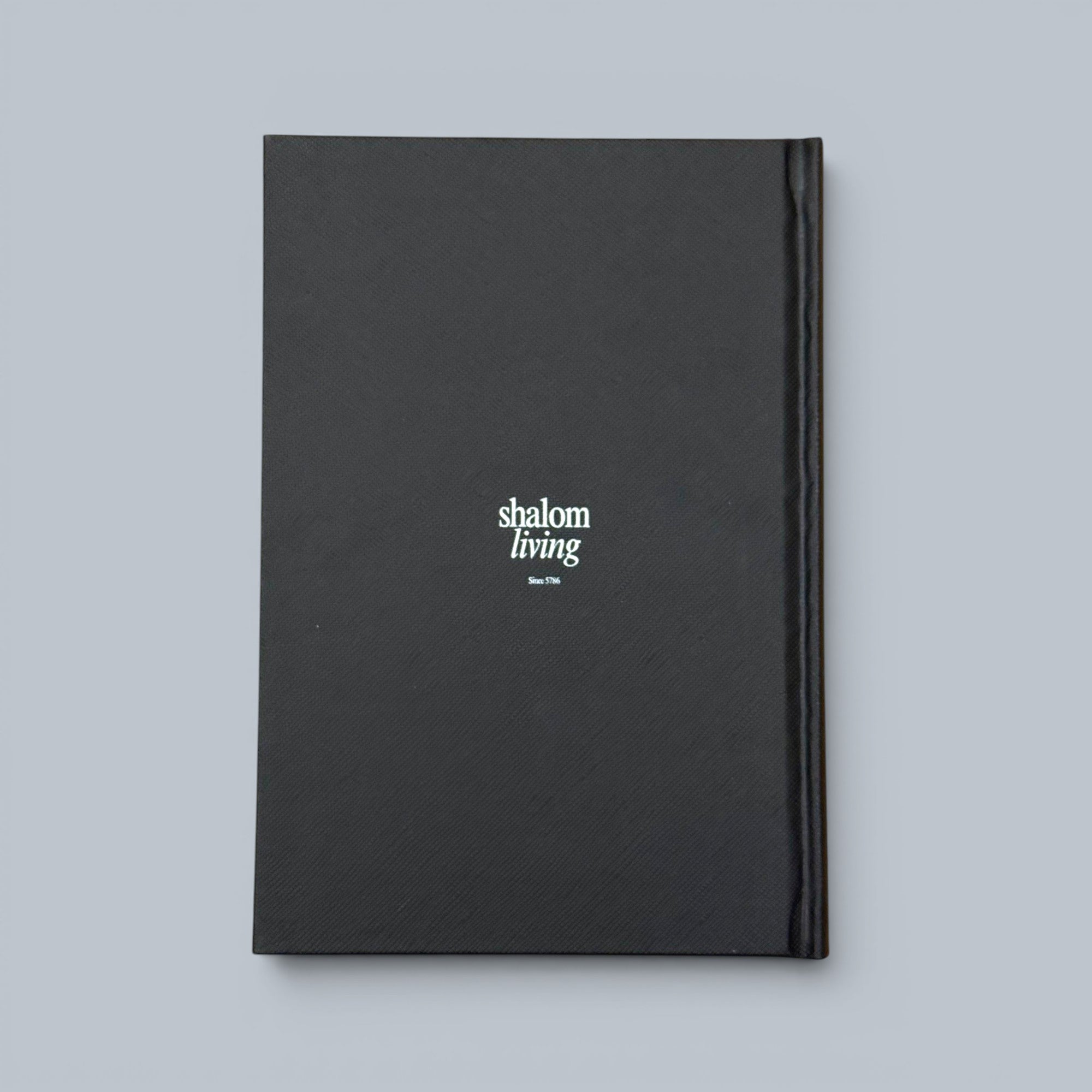 Shalom Living black hardcover journal book with 192 lined pages, perfect for reflections and prayers.