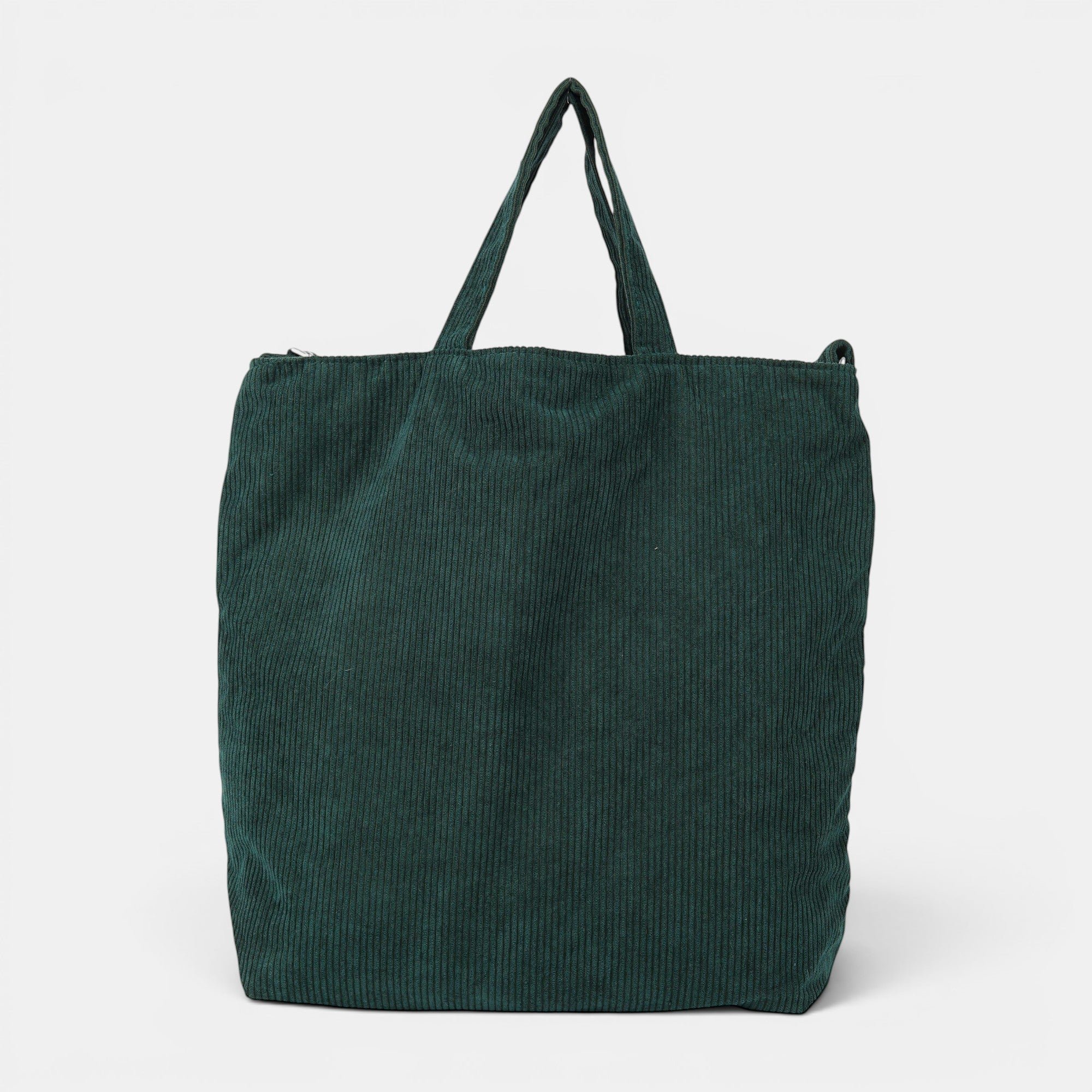 Shalom Living dark green corduroy tote bag with adjustable strap and inner zipper pocket.