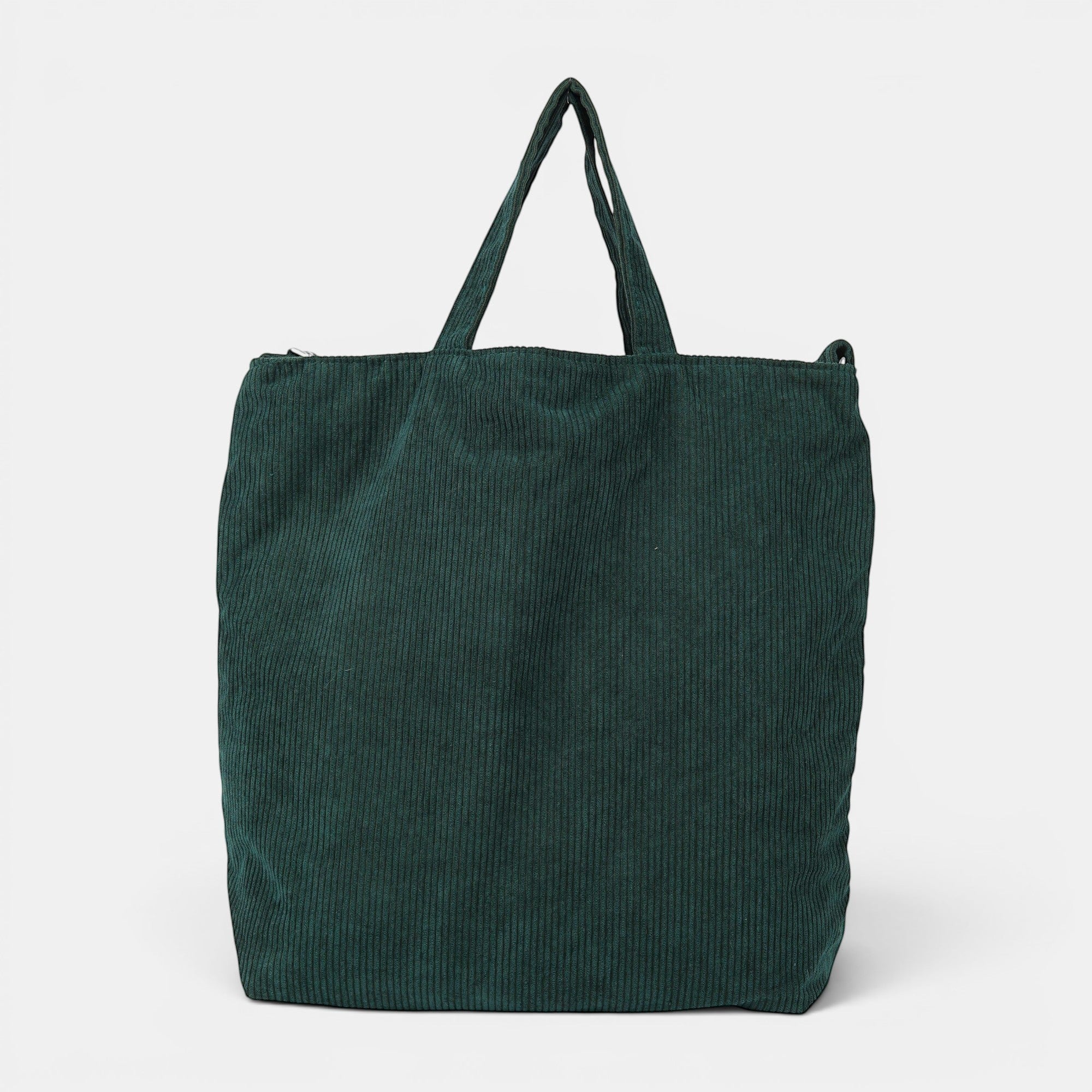 Shalom Living dark green corduroy tote bag with adjustable strap and inner zipper pocket.