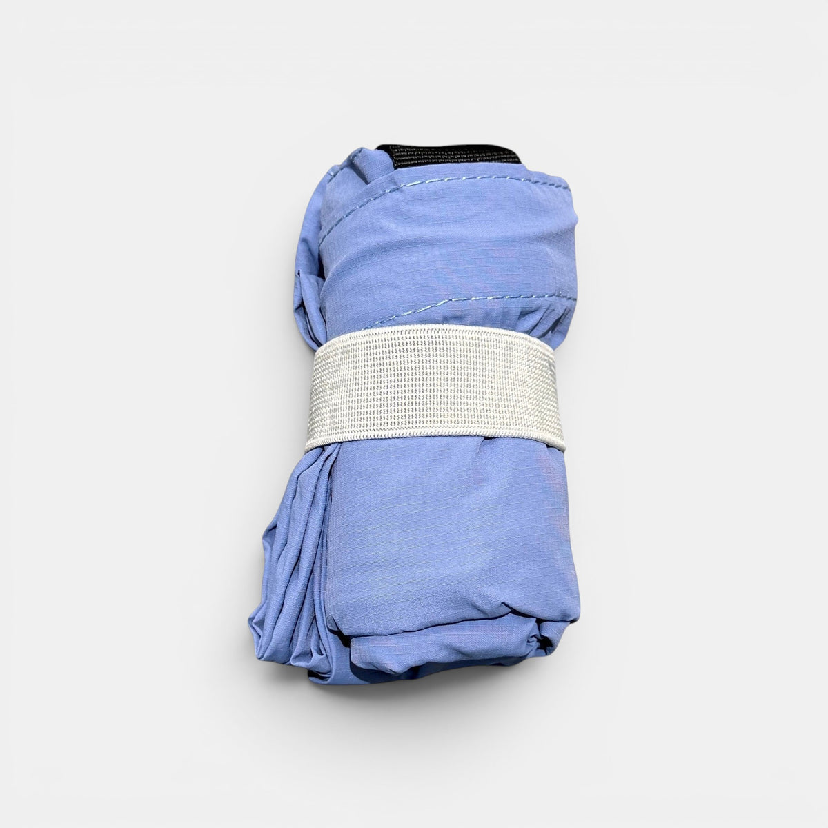 Shalom Living light blue foldable tote bag with elastic closure and inner zipper pocket.