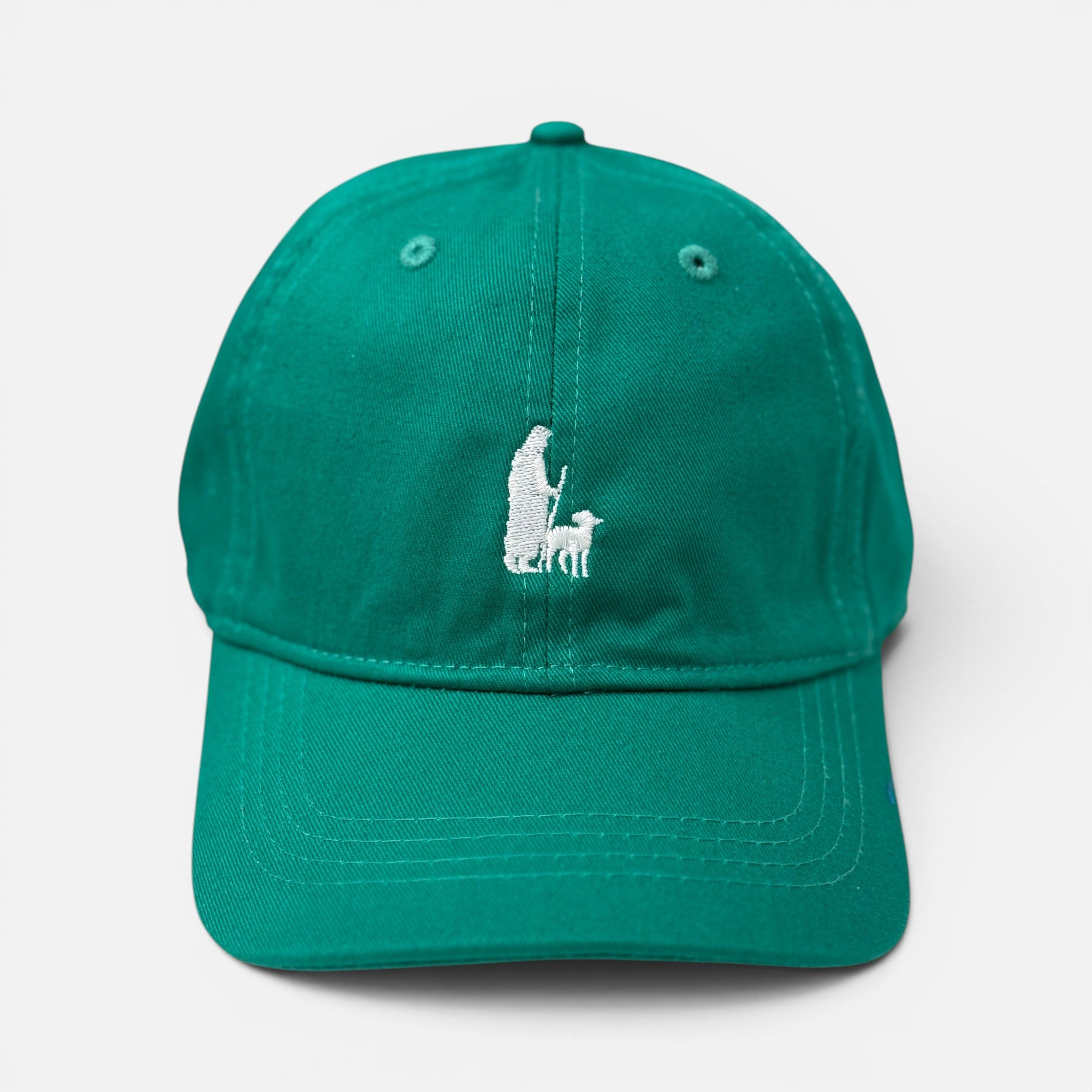 Shalom Living green cotton kids cap with white embroidered shepherd and lamb design on the front