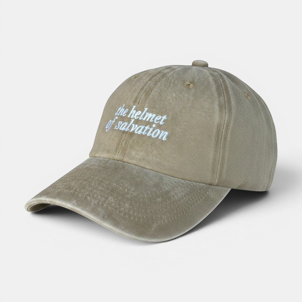 Shalom Living sand vintage washed cotton adjustable cap with embroidered "the helmet of salvation" text.