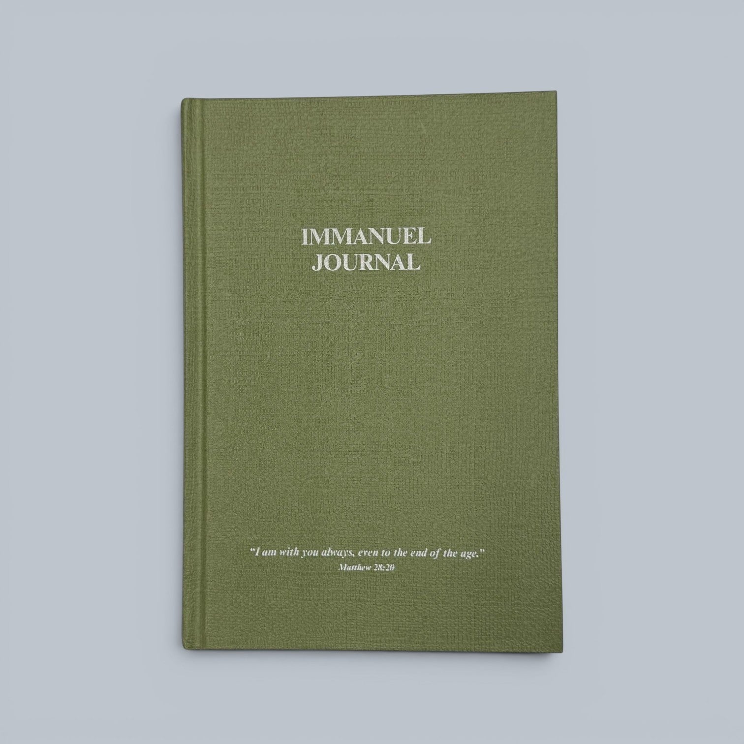 Shalom Living Immanuel Journal book with a softcover finish and lined paper pages. Features embossed text and a Bible verse.