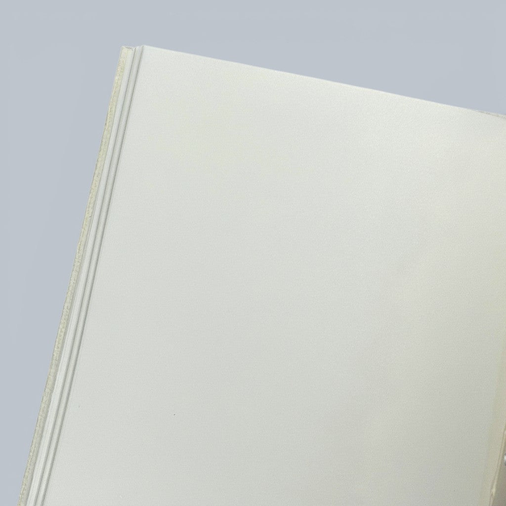 Shalom Living Consider The Lilies Journal Book, a lined journal with a fabric-covered hardcover and 192 pages of off-white paper.