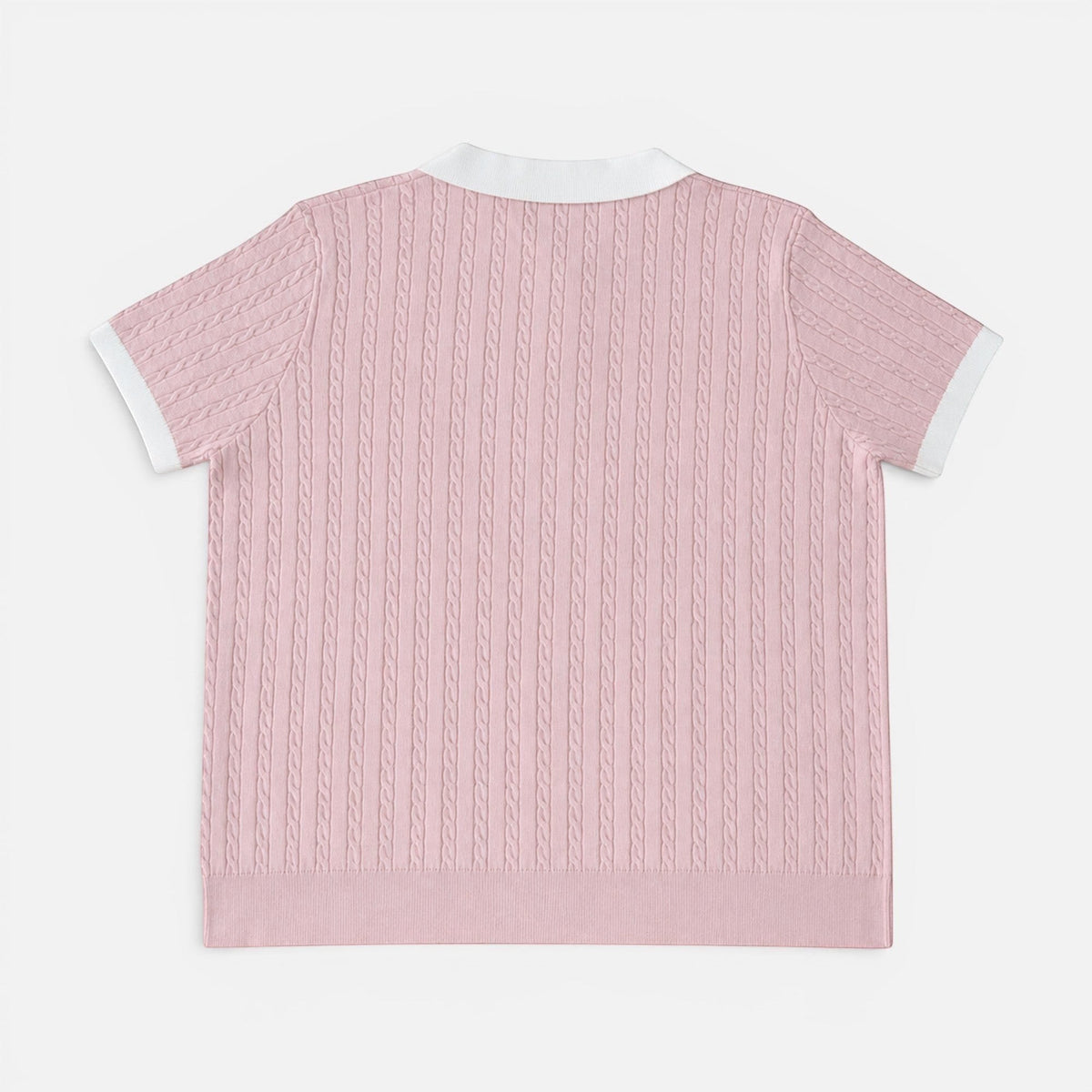 Shalom Living pink cable knit polo shirt with short sleeves and a white contrast collar, back view.