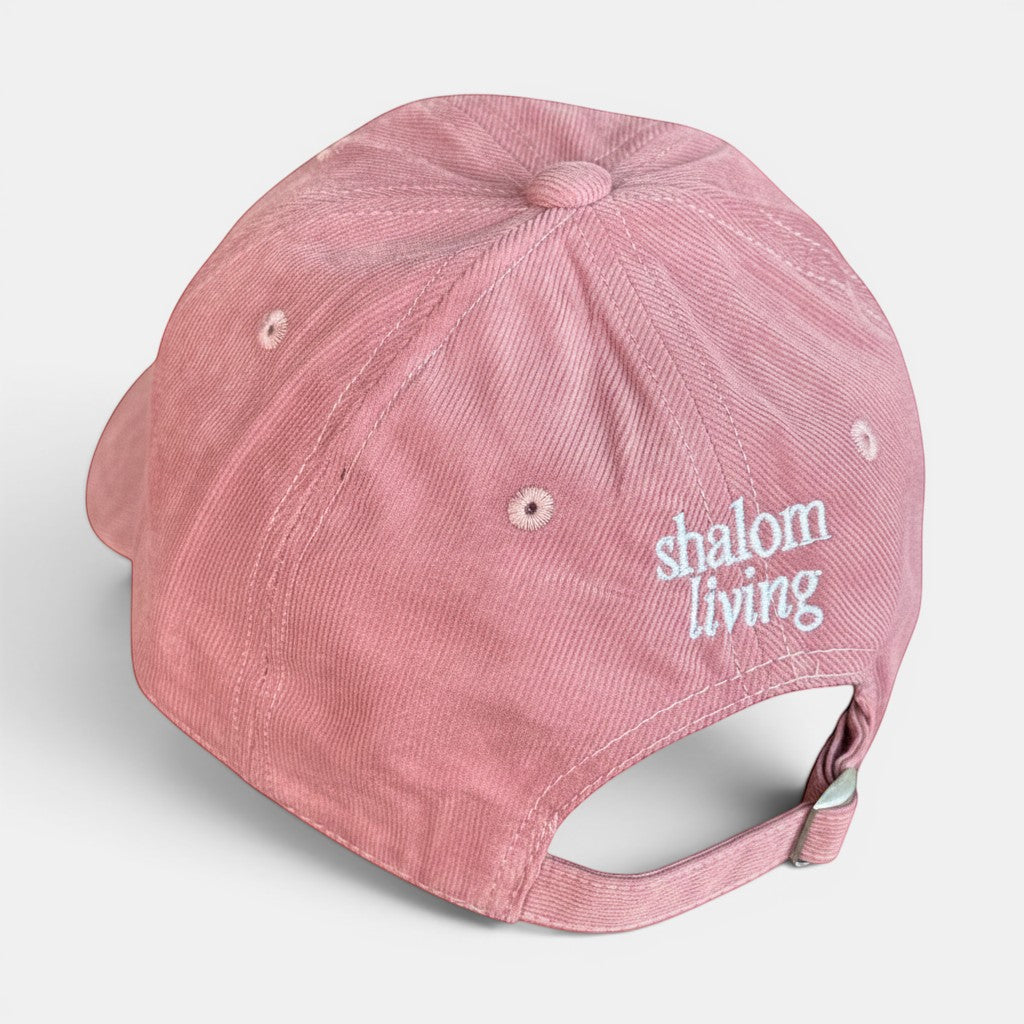 Shalom Living pink corduroy cap with adjustable strap and embroidered logo on back. Faith-based apparel.