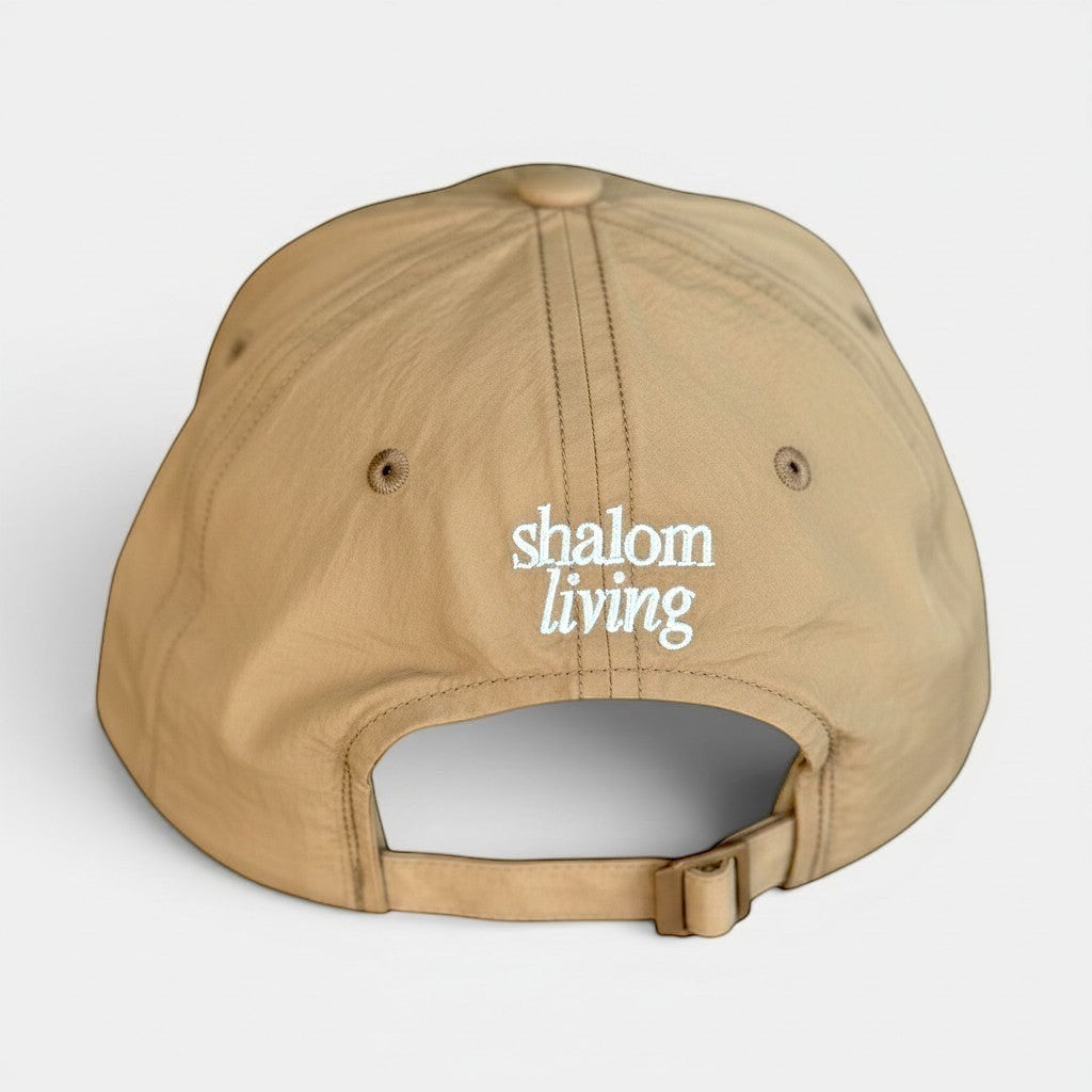 Shalom Living sand lightweight adjustable outdoor cap with embroidered logo, perfect for walks and daily wear.