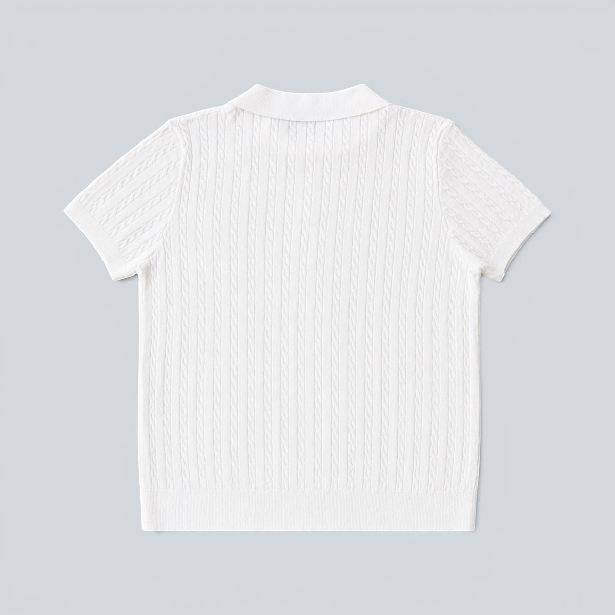 Back view of a white Shalom Living cable knit polo shirt with a classic collar and short sleeves.