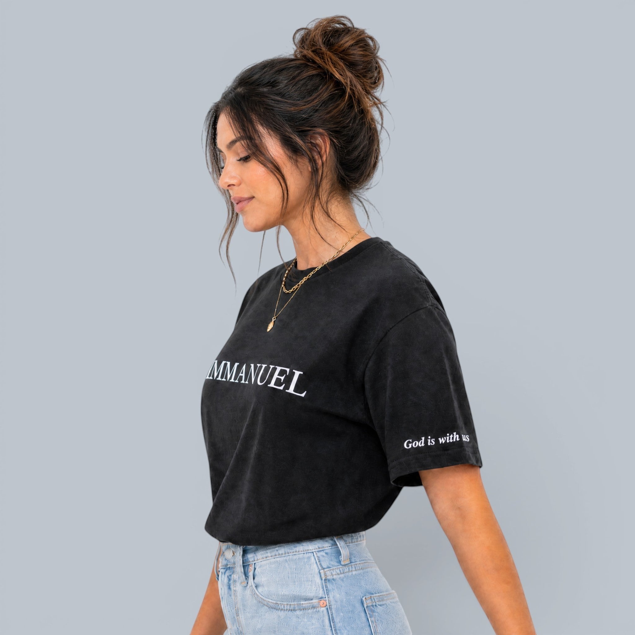 Shalom Living Immanuel relaxed fit black t-shirt with white text, made from lightweight cooling fabric.