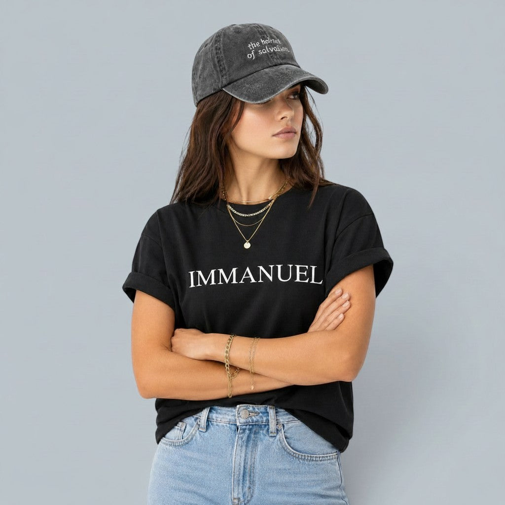 Shalom Living Immanuel Relaxed T-Shirt in black, lightweight cooling fabric, with rolled sleeves and white text.